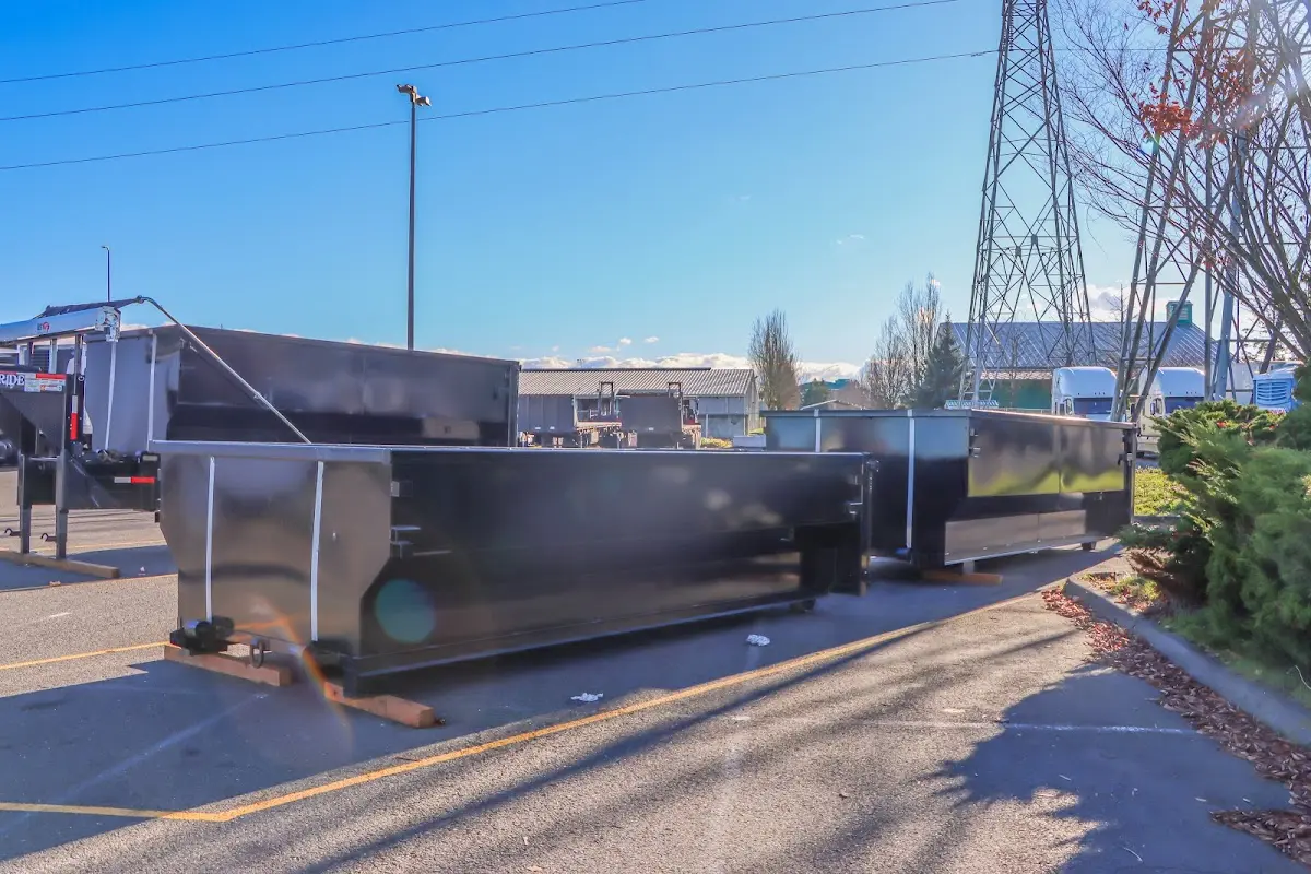 Roll-off dumpster ready for waste disposal at job site for Demolition Dumpster Rental in Grand Island